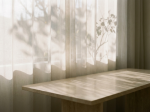 Morning light and shadow demonstrating how under-eye hollows create dark circles through shadowing effect
