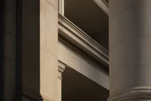 Architectural detail showing strong angular lines and shadows representing chin contour enhancement in Bakersfield