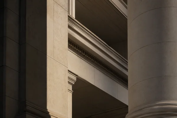 Architectural detail showing strong angular lines and shadows representing chin contour enhancement in Bakersfield